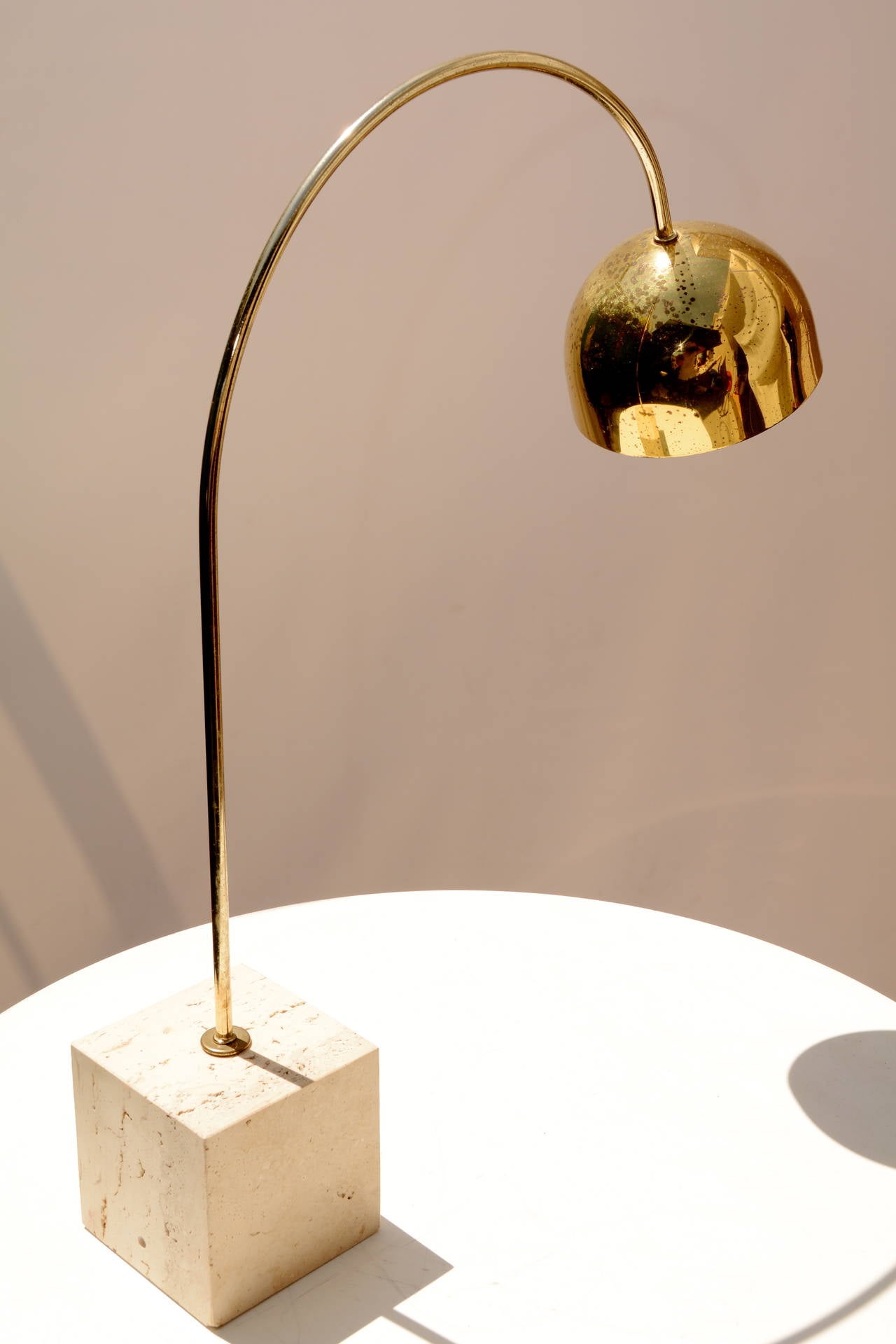 Modern Guzzini Brass Arc Table Lamp with Travertine Base