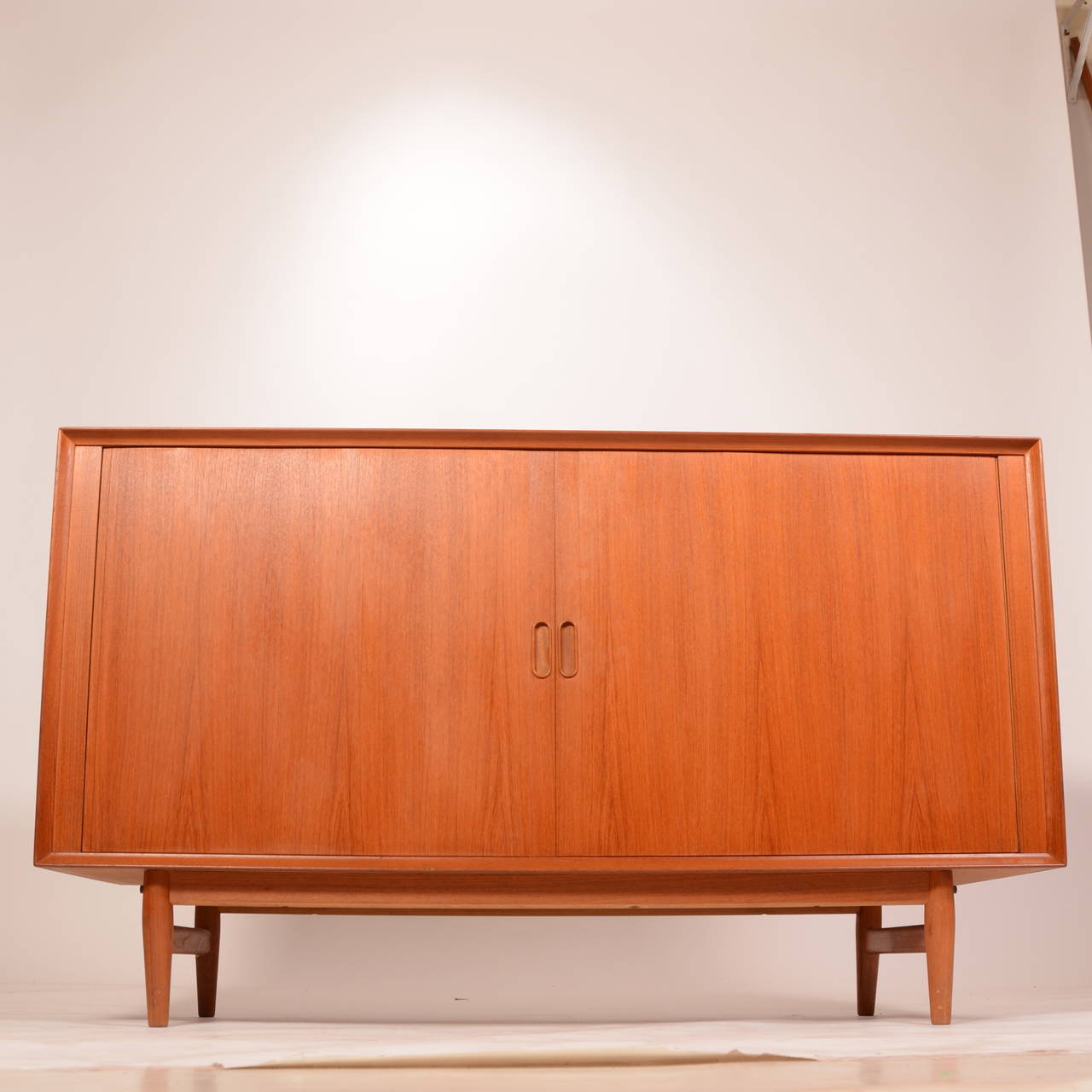 This credenza is in excellent condition! If features grain matched tambour doors, top access storage for glassware, removable vertical dividers and excellent construction. 

Local pick up available at our Los Angeles showroom.