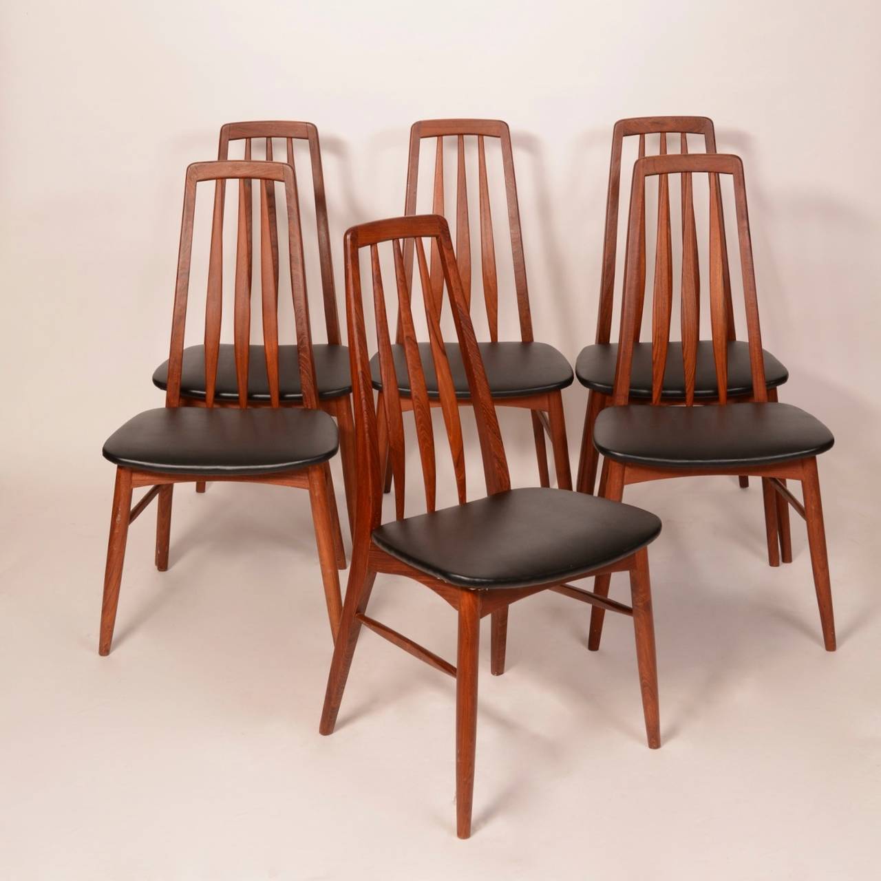 The Eva chair by Niels Koefoed for Hornslet Mobelfabrik in teak. New high grade vinyl upholstery.  Chairs are in good vintage condition.  We have only 2 left in stock.  price is per chair.
