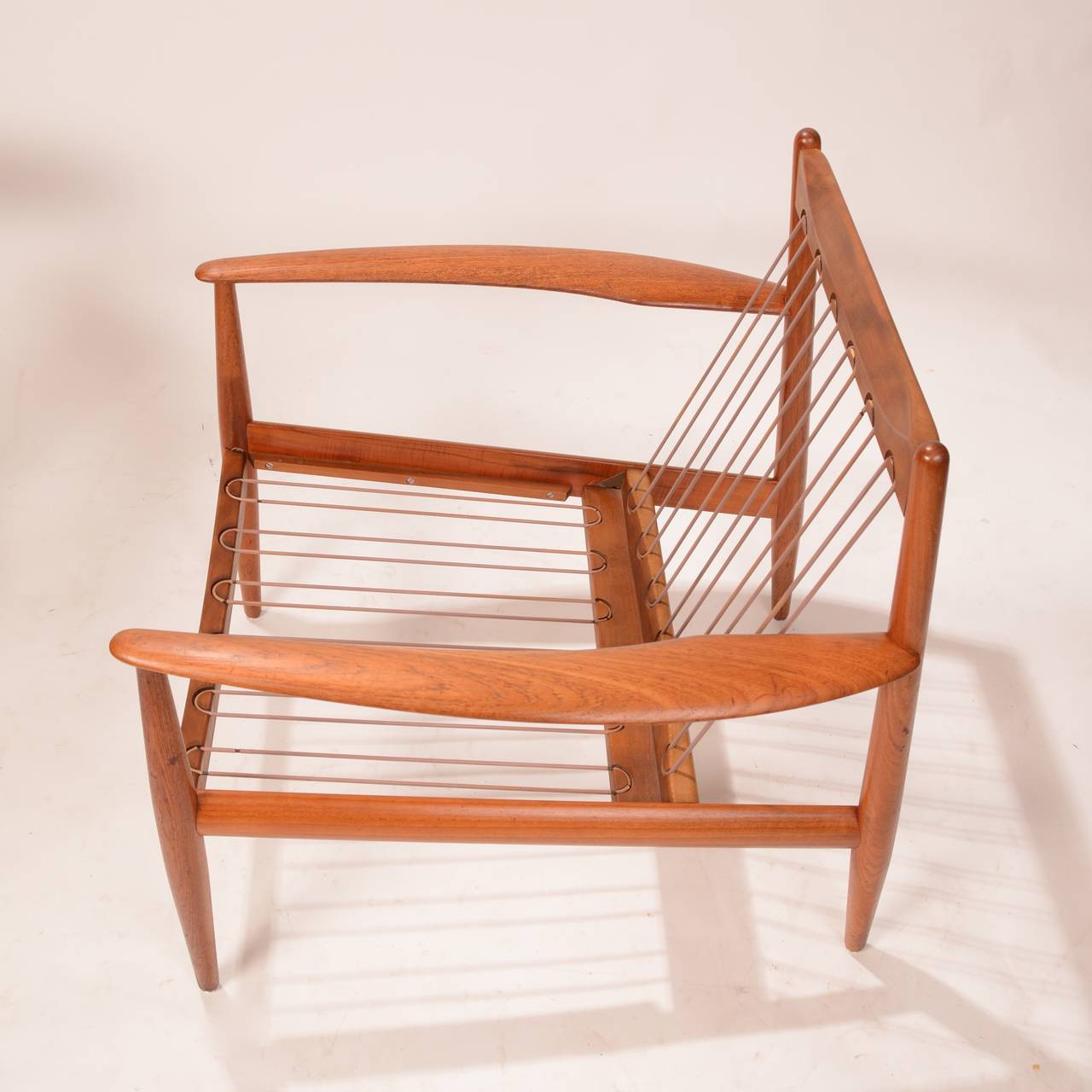 Early Grete Jalk Teak Lounge Chairs with Banding Backs and Seats 2