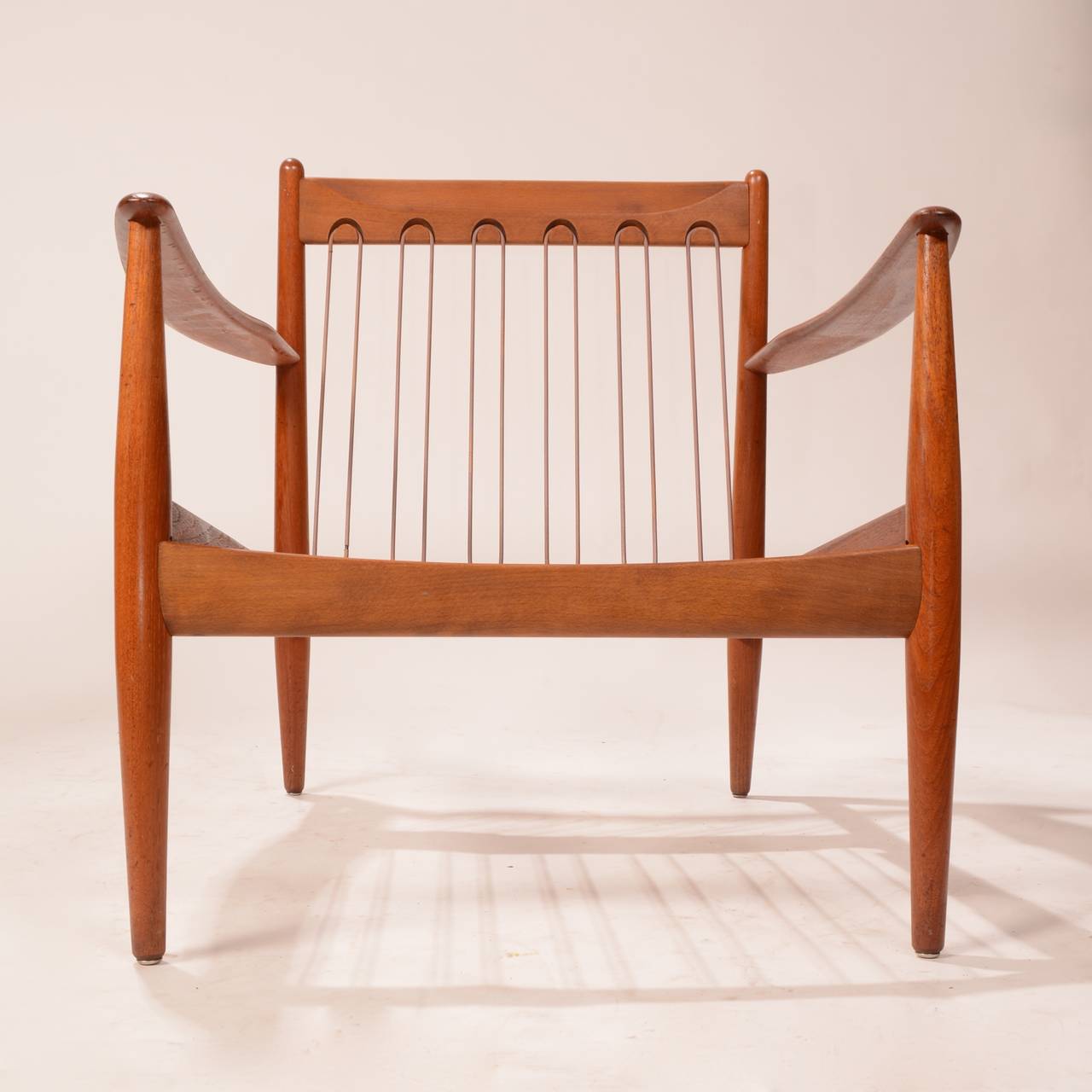Early Grete Jalk Teak Lounge Chairs with Banding Backs and Seats 3