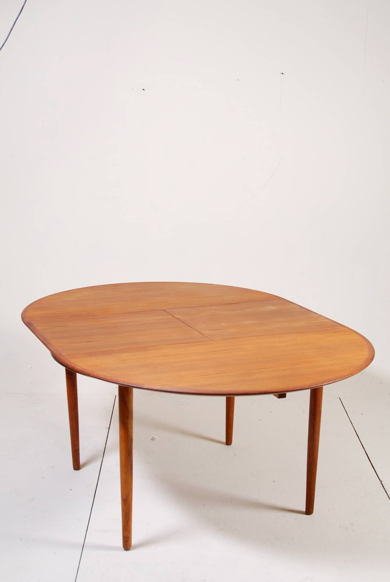 Scandinavian Modern Round Danish Modern Teak Dining Table by Dyrlund