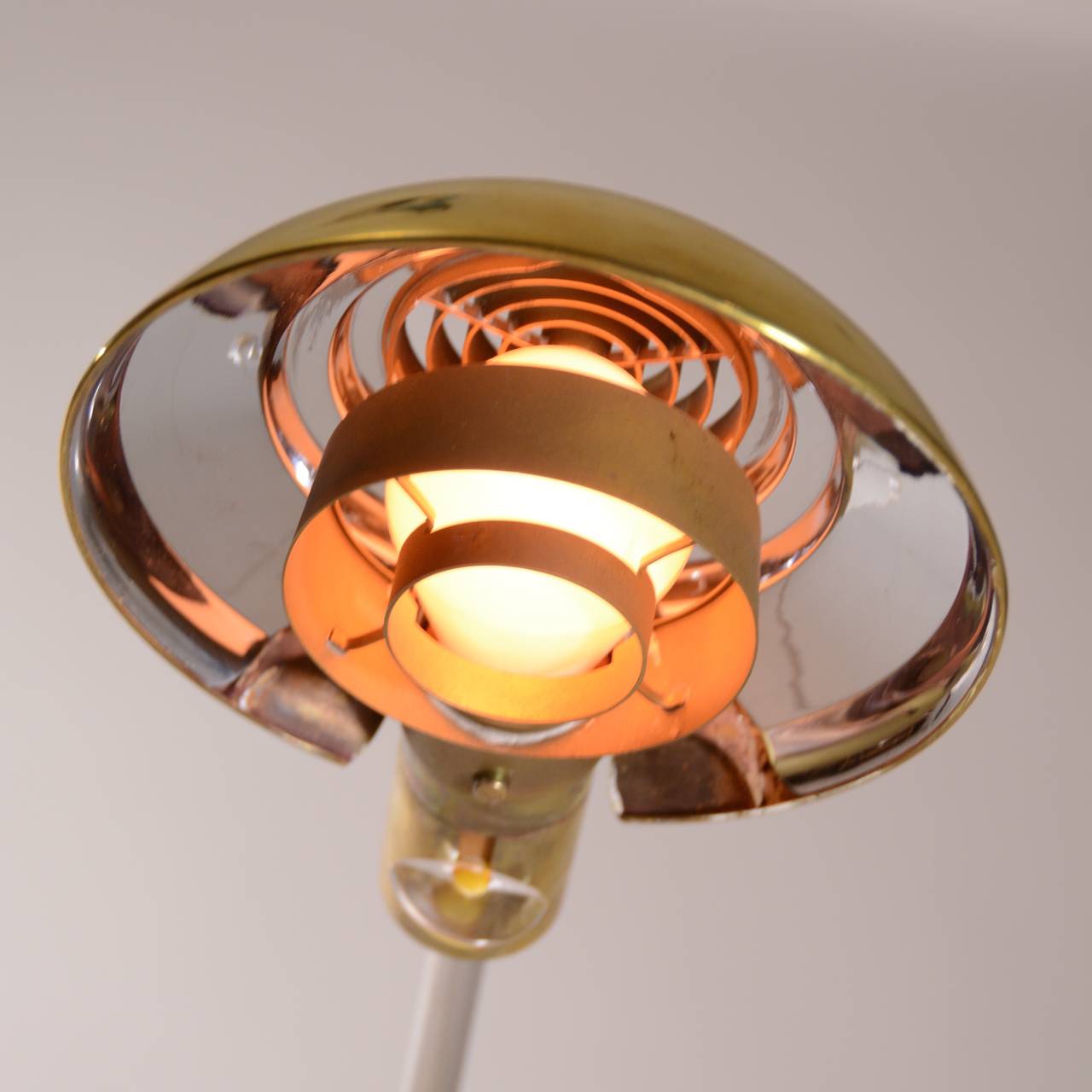 This is a great pair of adjustable height and swivel pharmacy lamps by Cedric Hartman. 

Base: 3