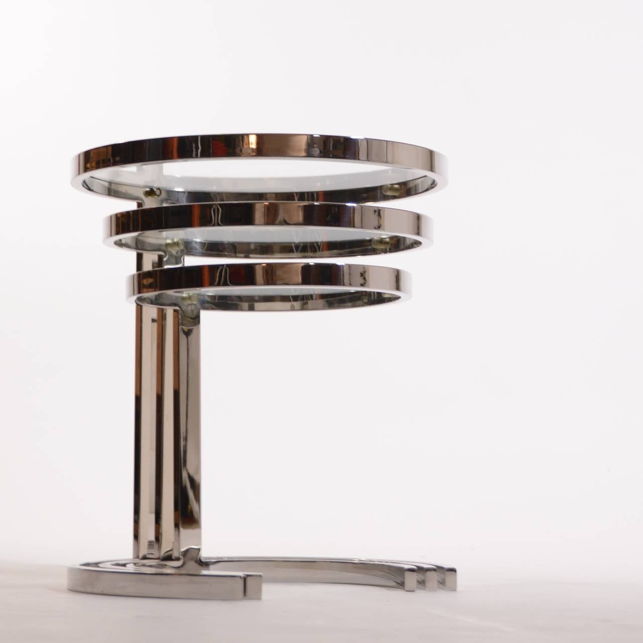 This is a beautiful set of 3 stainless steel nesting tables by Brueton circa 1982.  These tables are flawless and show almost no wear.  

Small Table: 12