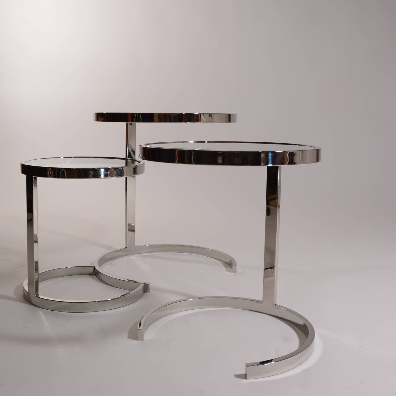 Set of 3 Nesting Stainless Steel and Glass Nesting Tables by Brueton In Excellent Condition In Los Angeles, CA