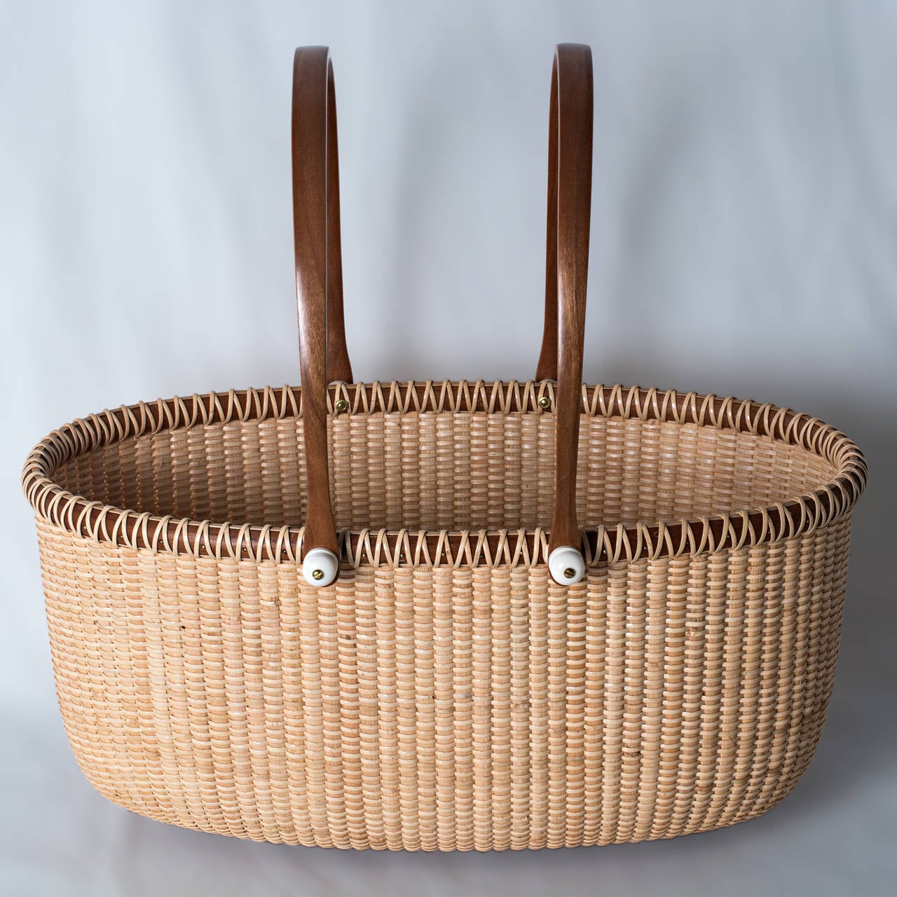 Tall Oval Double Handle Basket by Lucille LaRochelle at 1stDibs