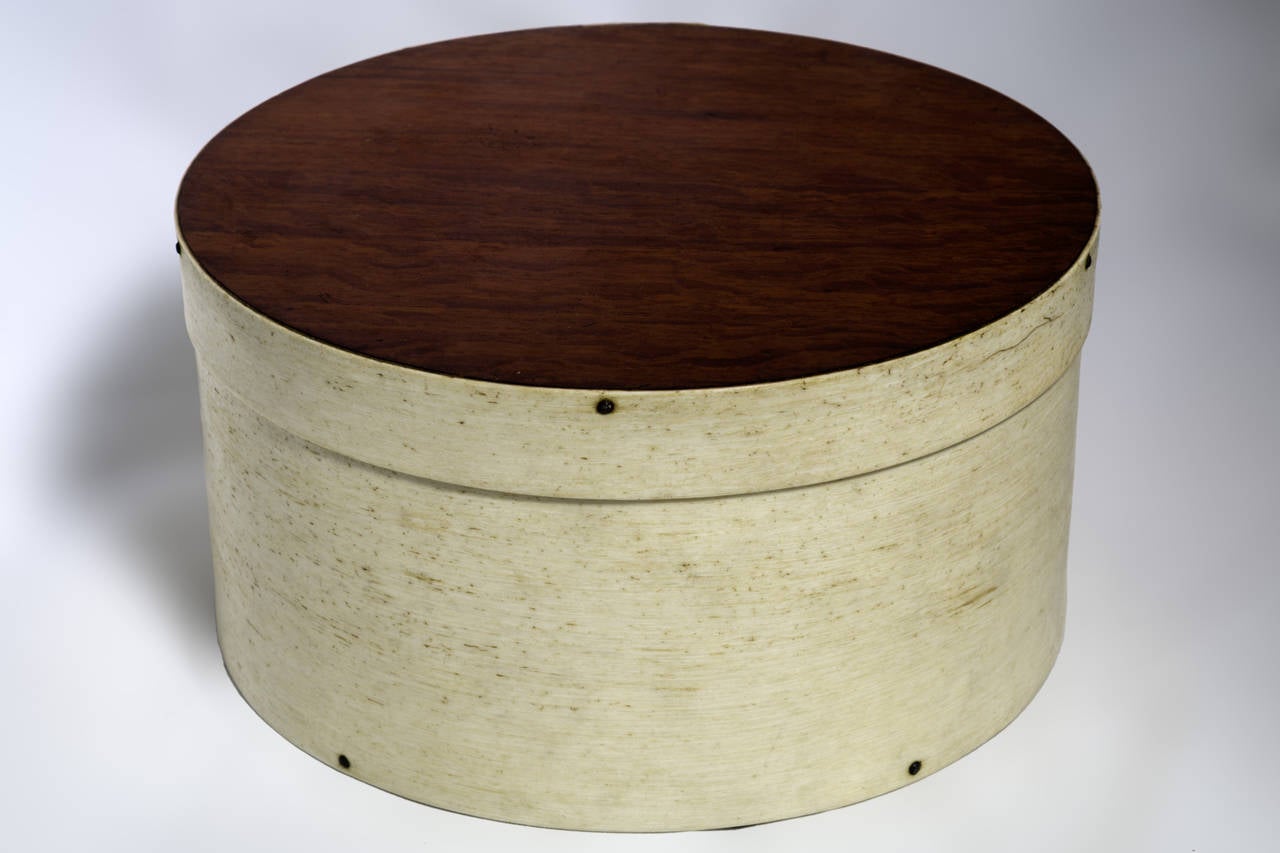 Ditty boxes were used by sailors to store small tools and personal items,the body is made of out whalebone with a Mahogany top and bottom.Similar in construction to a shaker box with seven scallop fingers and a double line of rivets.
American,