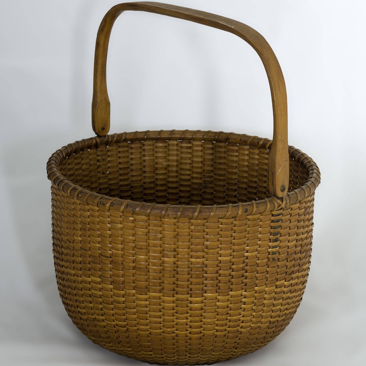 Exceptional Nantucket Lightship basket in excellent condition made by Sherwin Porter Boyer (1907-1964). The basket bears Boyers stamp and jelly label that reads:
