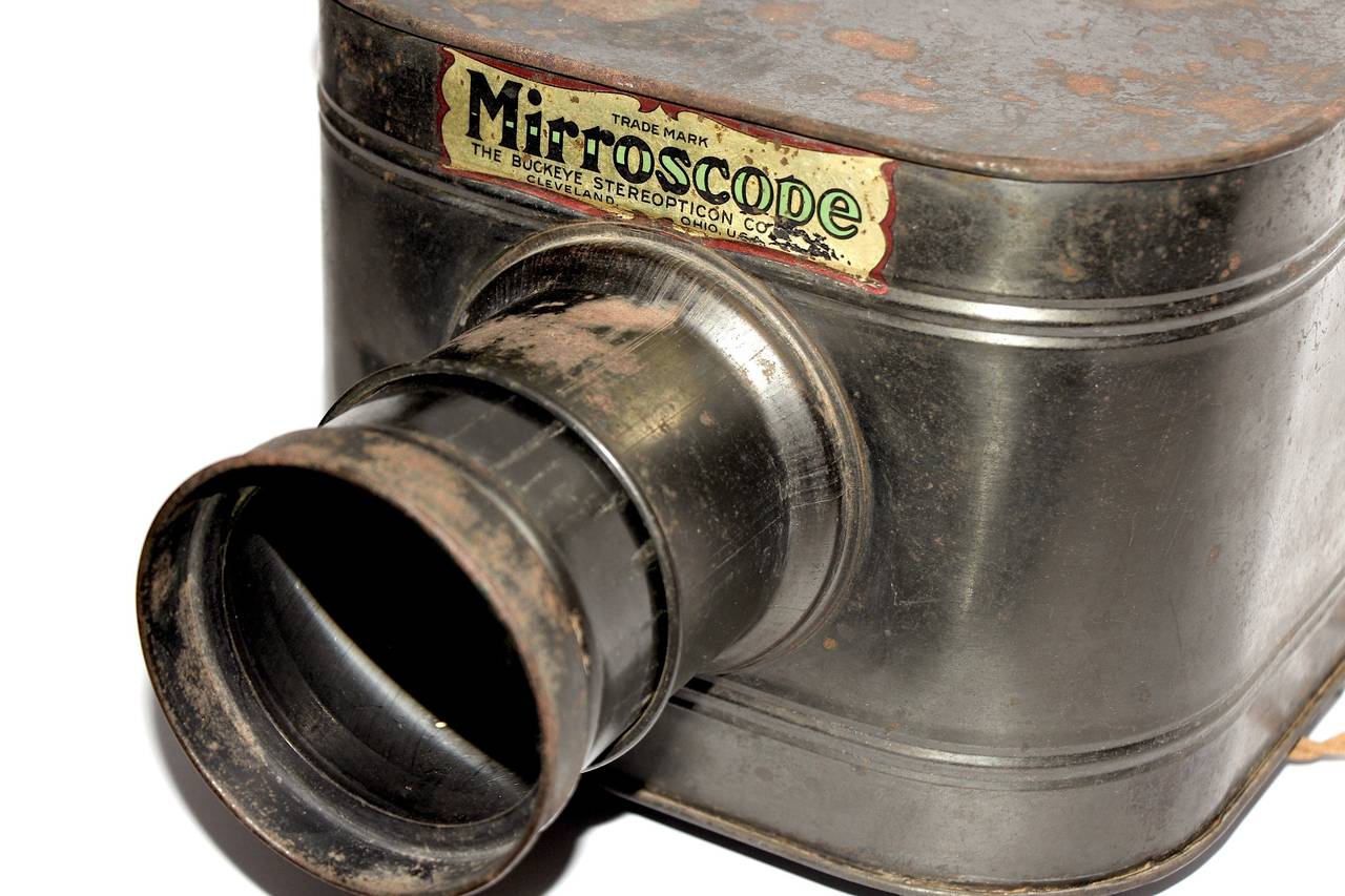 A lovely well patinaed, circa 1912 opaque projector.
Will look wonderful on a shelf, coffee table or on a tripod type stand.
Large lens, original feet intact. Unmolested original finish.

No tripod or stand included but available for your