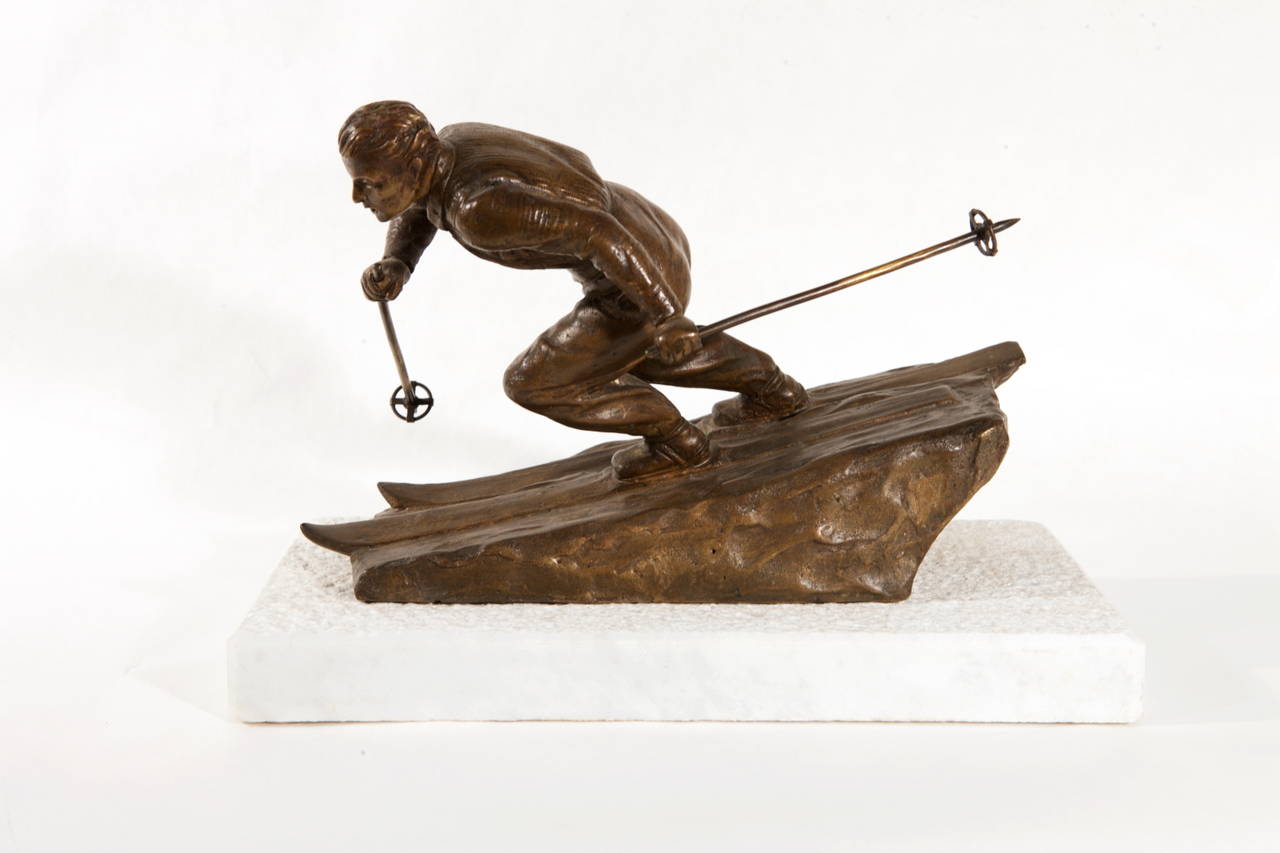 A downhill skier in patinated bronze mounted on a glacial marble base, white  like snow.
Signed   G. Rossi : Giorgio Rossi, famous Tuscan sculptor (born 1/13/1892, died in 1963).
O/6826 -