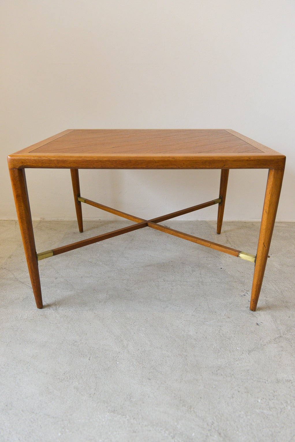 Beautiful mahogany and brass x-base side or end table from the ‘Sophisticate’ line by Tomlinson.  Classic and timeless x-base design with great brass detail on the joints of the crossbars.  Lovely bias cut wood inlay on the top.  Excellent vintage