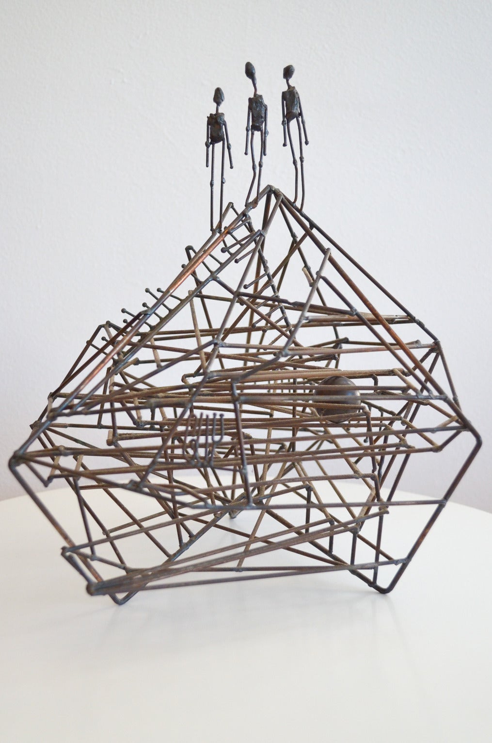Beautiful kinetic wire sculpture by California artist Guy Pullen. Made of welded copper wires and signed by the artist. Includes one stainless steel ball that makes its way through the maze. We also have the larger version of this piece available in