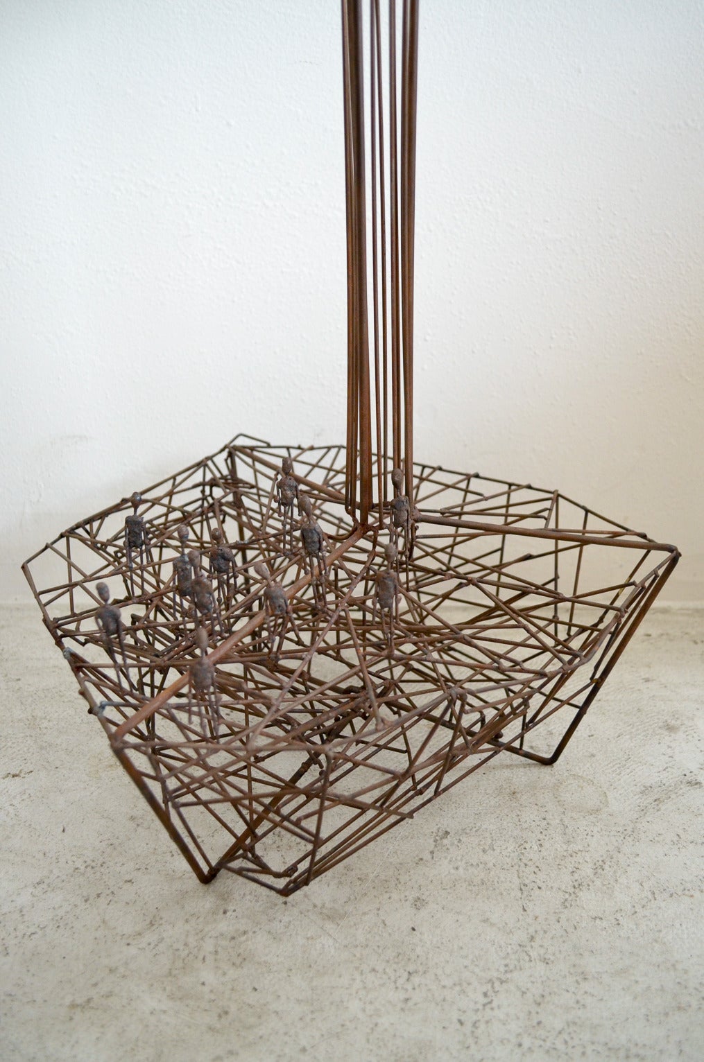 Amazing and rare large kinetic wire sculpture by artist Guy Pullen. Three marble balls enter at the top of the sculpture and make their way down to the bottom of the tower. Original one of a kind piece, this is a great conversation piece for your