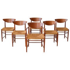 Peter Hvidt/Orla Mølgaard-Nielsen Sculpted Teak Dining Chairs