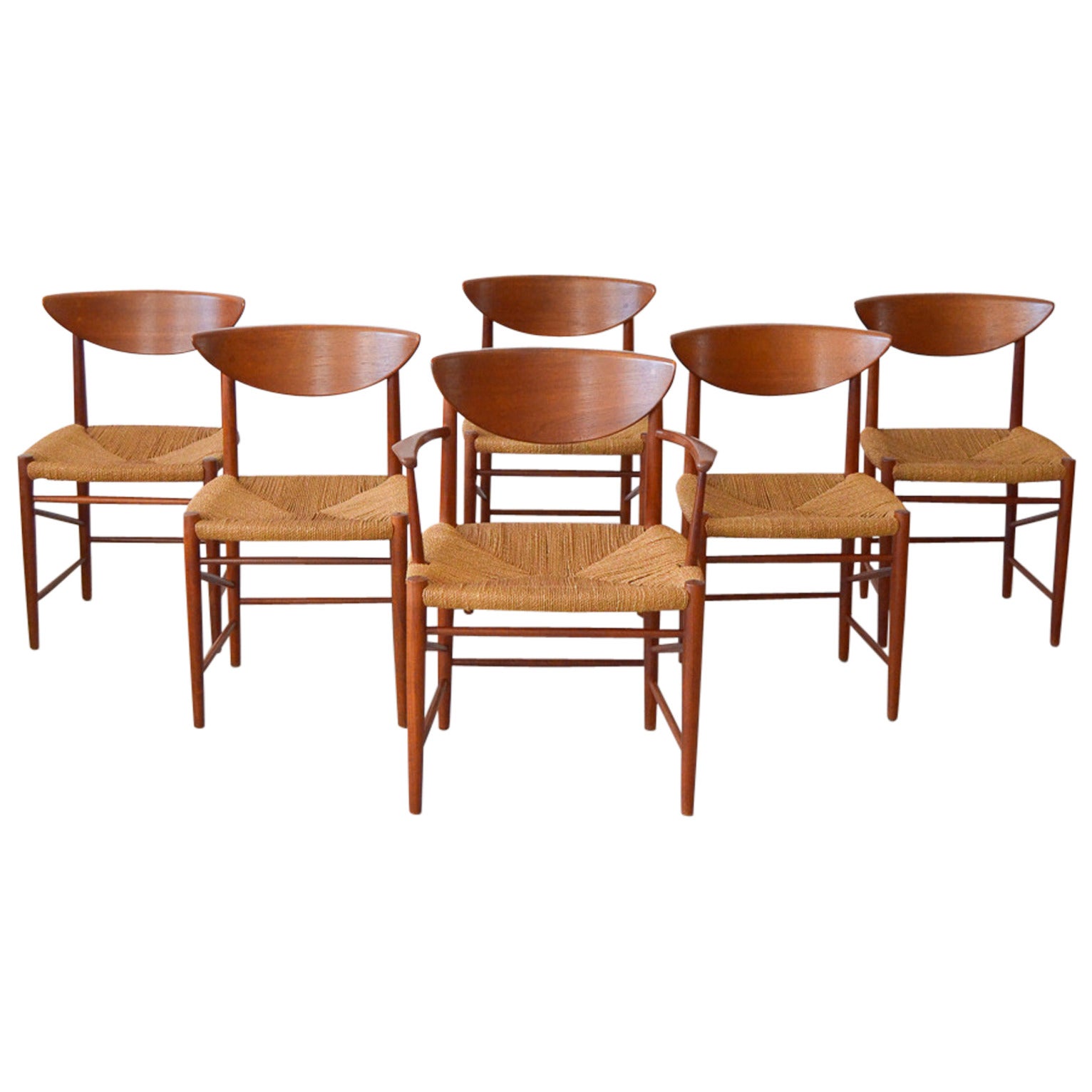 Peter Hvidt/Orla MølgaardNielsen Sculpted Teak Dining Chairs at 1stDibs