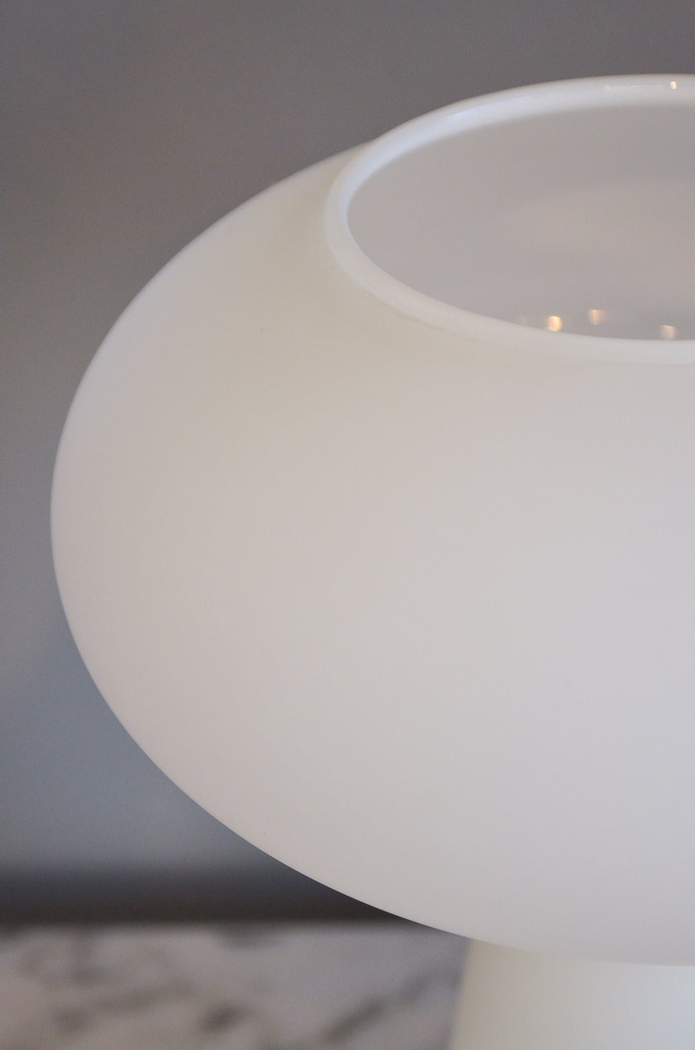 A stunning table lamp designed by Lisa Johansson-Pape of Finland in 1960. Beautiful frosted opaque glass in a lovely soft mushroom shape. Emits beautiful soft light, looks amazing on your desk or side table, nightstand or anywhere you need a little