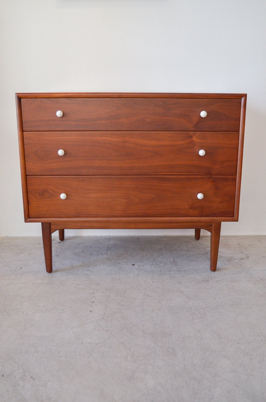 Pair of Kipp Stewart for Drexel Declaration three-drawer dressers or cabinets. Could also be used as bedside tables or nightstands. Both are identical, came from the same estate and have been professionally restored and in showroom perfect