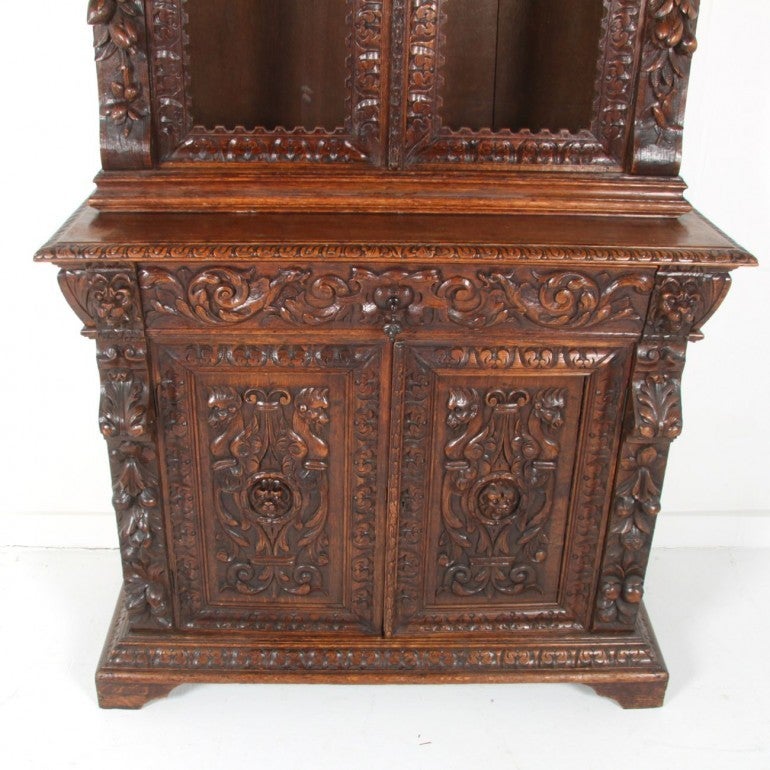 19th Century highly decorative French Renaissance revival bookcase. Fabulous hand-carved detail in excellent original condition.