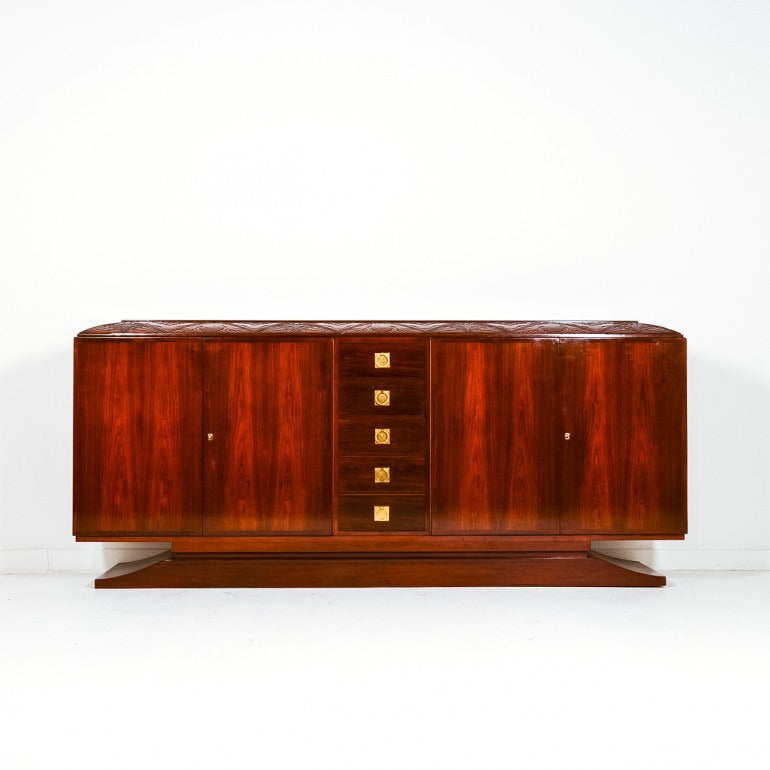 Exceptional and rare, a French art deco sideboard signed by ‘Georges De Bardyere’ (1883-1941), an important French deco designer of his time. The piece is a combination of solid mahogany (motifs of baby birds being fed by the parents and baby fish