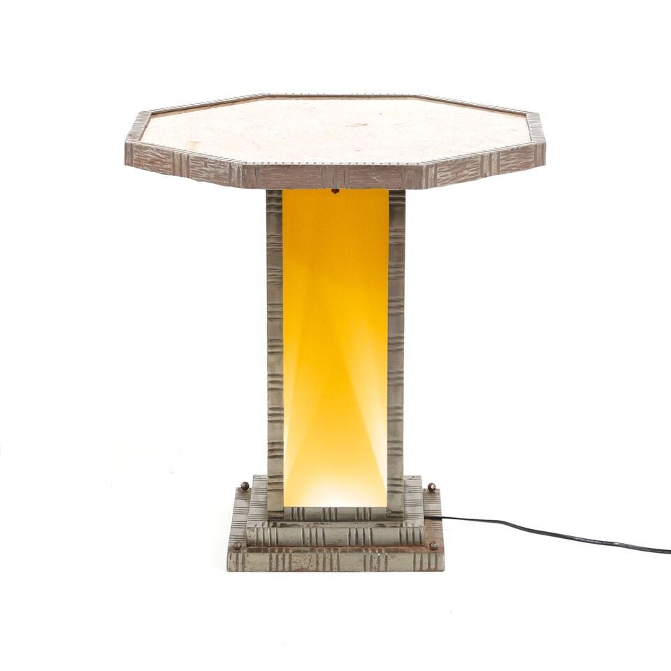 Superior quality solid steel and marble, electrified gueridon or side table from France in the manner of Edgar Brandt, circa 1920. The base lights up and casts a beautiful soft glow. Not CSA approved. Sold 'as is' although the table is in excellent