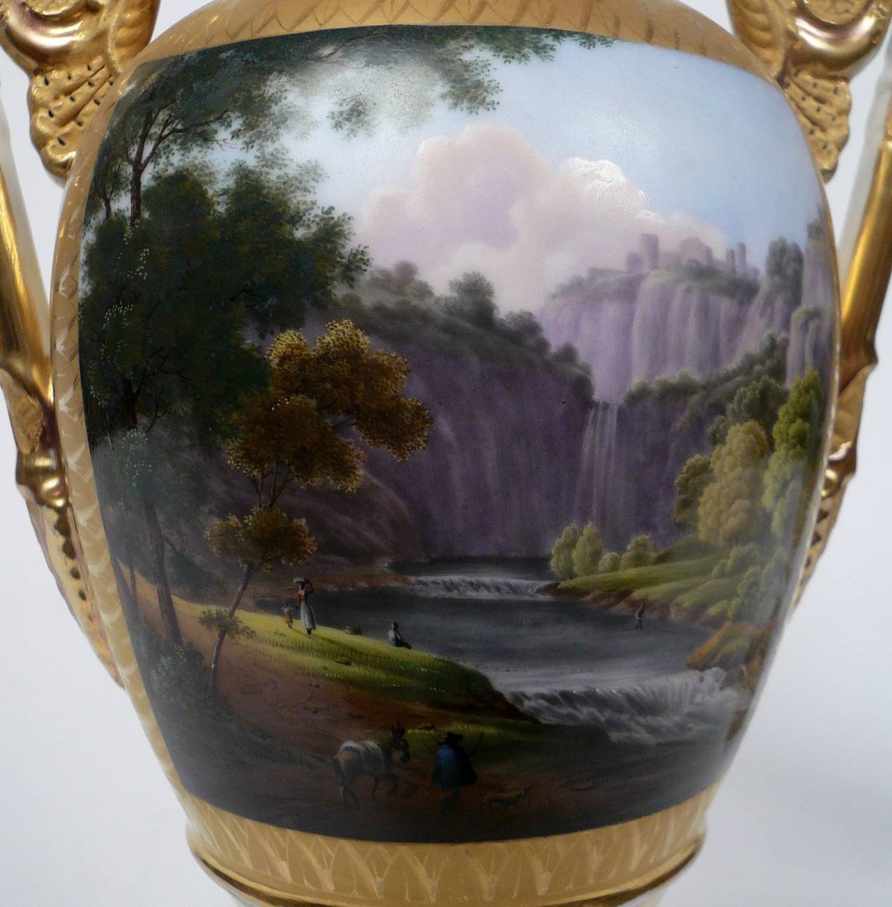 These 19th Century Paris porcelain urns are beautifully painted with Alpine scenes, and signed L. Brochard.