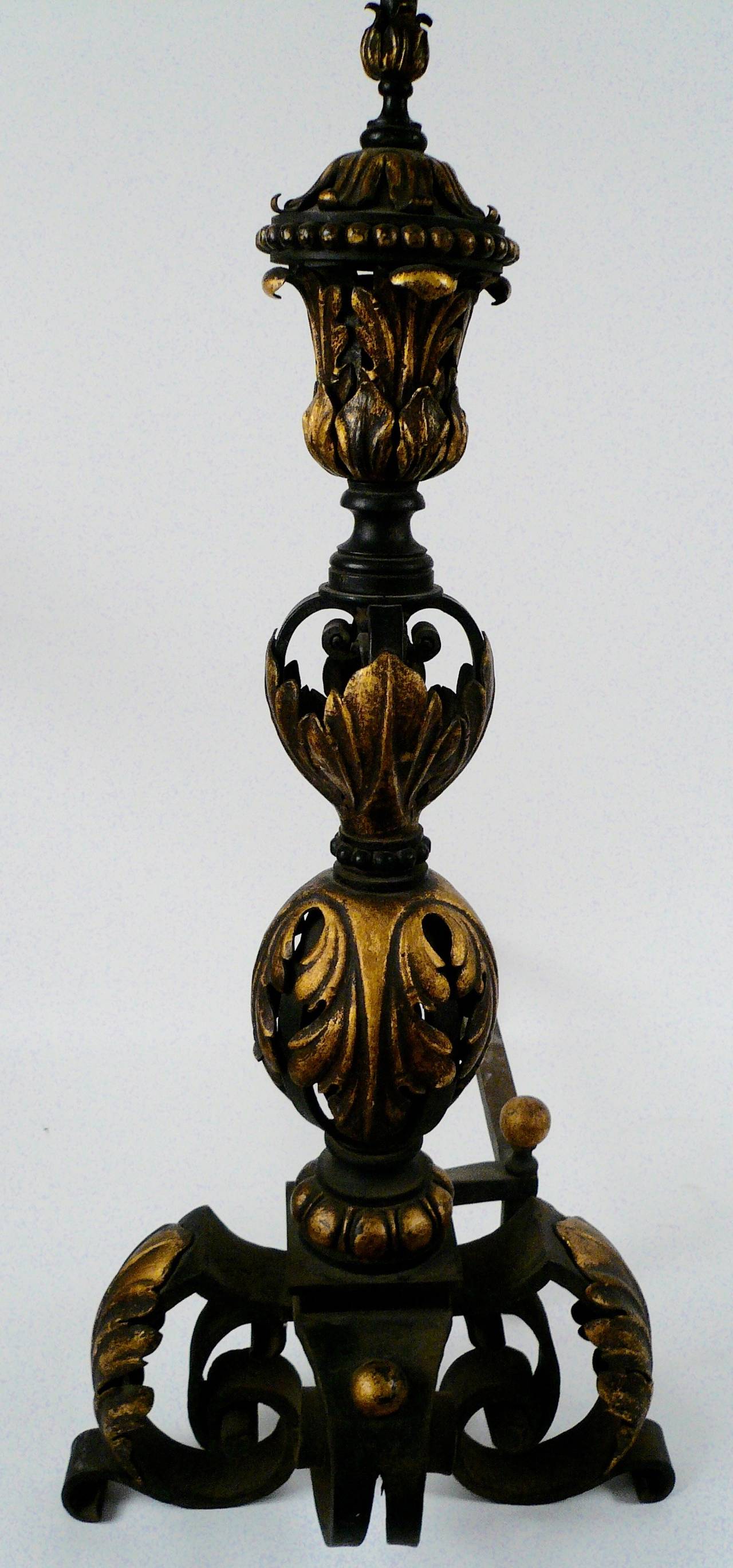 Renaissance Massive Pair of Patinated and Gilt Wrought Iron Andirons