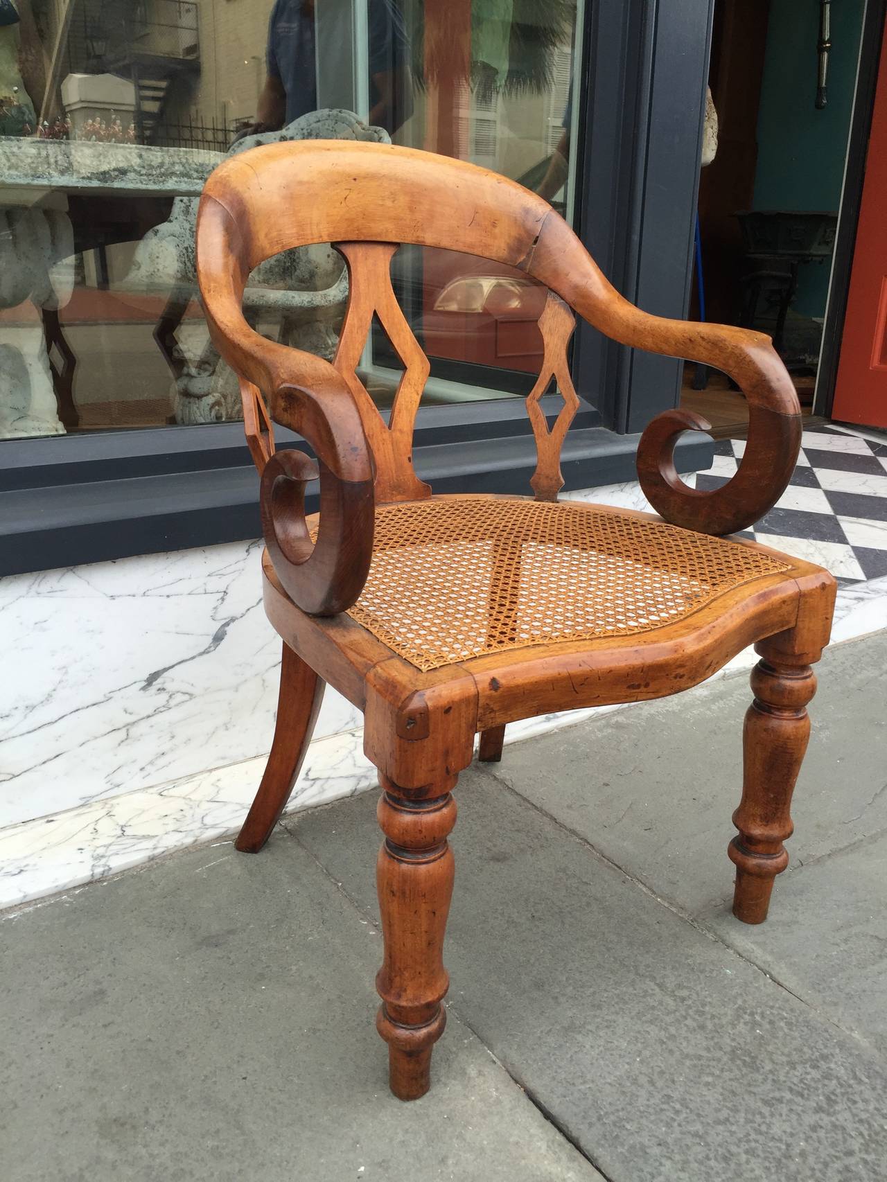 Great Britain (UK) 19th century English walnut with cane bottom arm chair