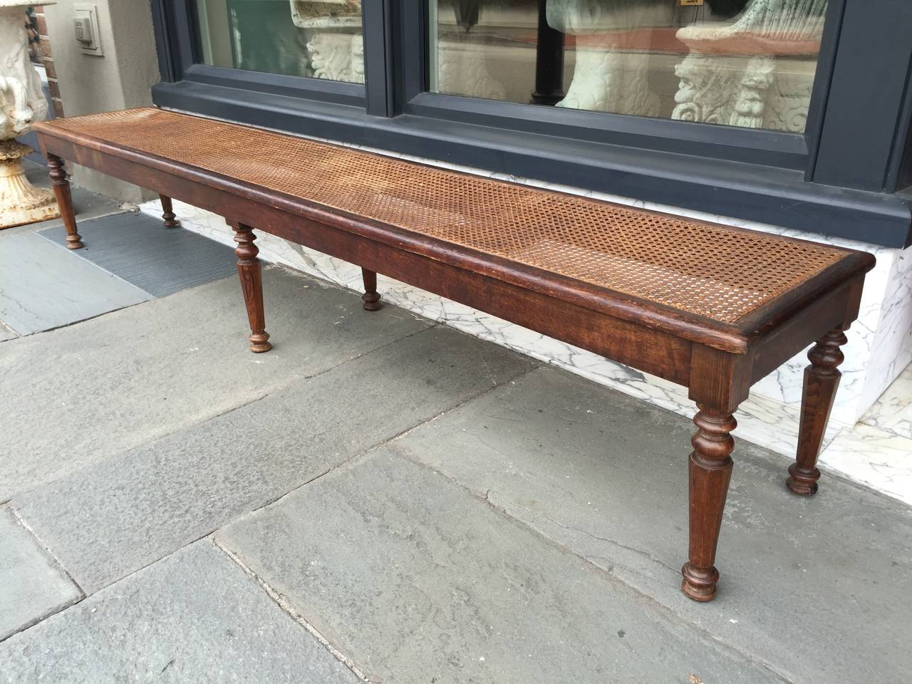 American cain bottom hall bench with turned legs circa 1920