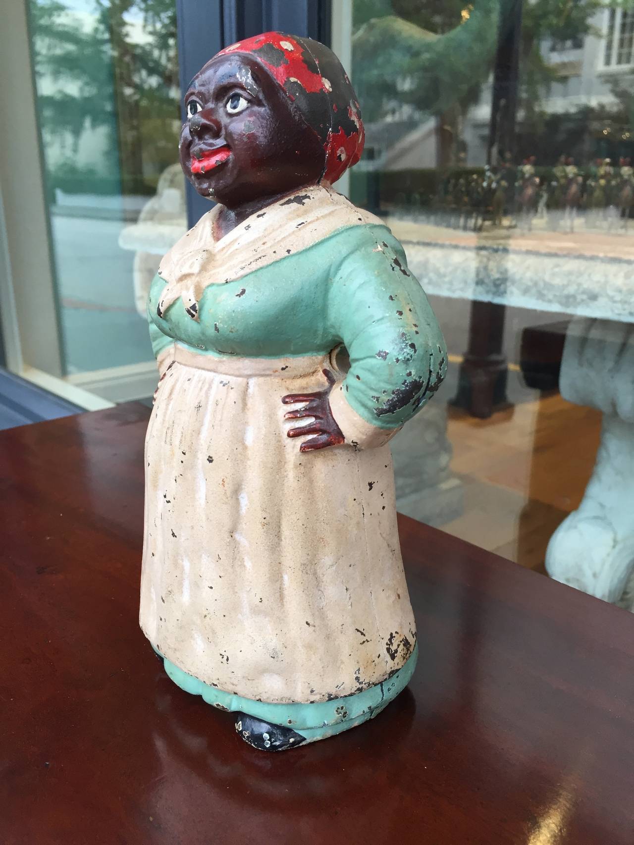 Cast iron doorstop in figural aunt jemima from