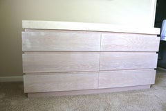 Six-Drawer Chest of Drawers in Cerused Oak with a Stone Top