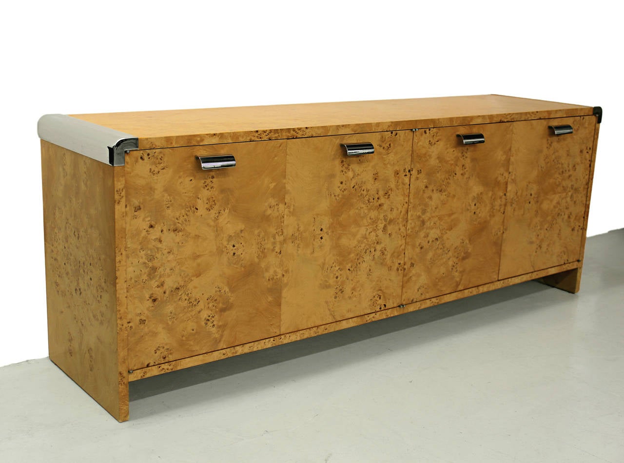 Midcentury burl and chrome Credenza Sideboard often attributed to Pace but is unmarked.  This piece if far more than a great piece of functional furniture, it truly is a piece of art.  With absolutely stunning burl grain and chrome details, it