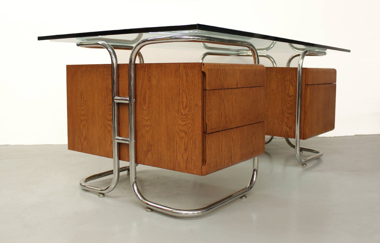 RARE and incredibly awesome 1970s midcentury tubular chrome pedestal desk by Pace for the Pace Collection.  This desk features two pedestal units that are constructed out of drawer oak boxes, supported within an artistically crafted tubular chrome