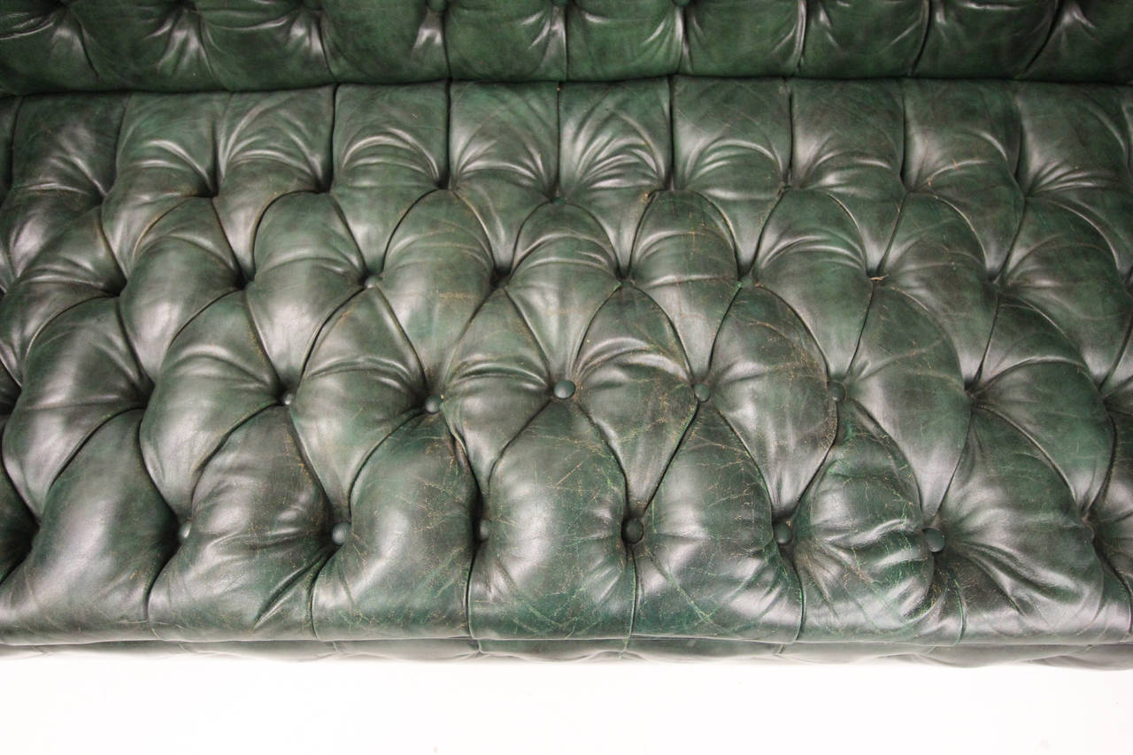antique green leather sofa