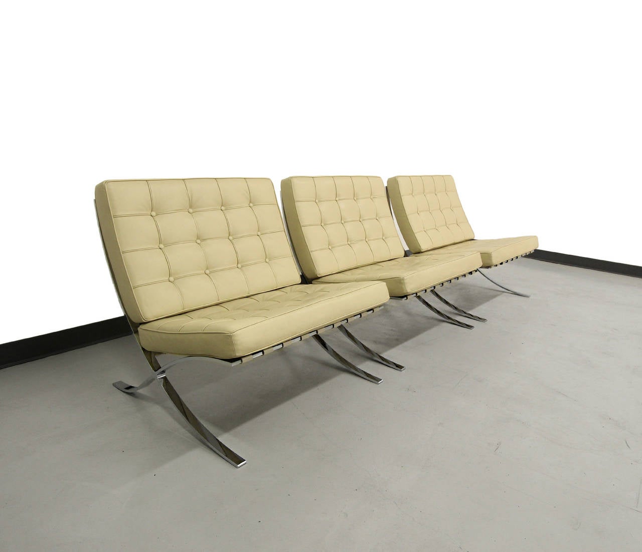We have 3 all original, early and authentic, Mies van der Rohe for Knoll Barcelona chairs.  Chairs are most likely from the 60's and retain their original cream leather cushions which are in excellent condition.  Chrome is mirrored and perfect.  See
