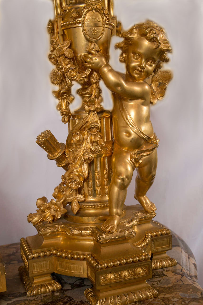 Louis XVI  Doré Bronze Three-Piece Clock Set with Cherubs by Charpentier & Cie For Sale