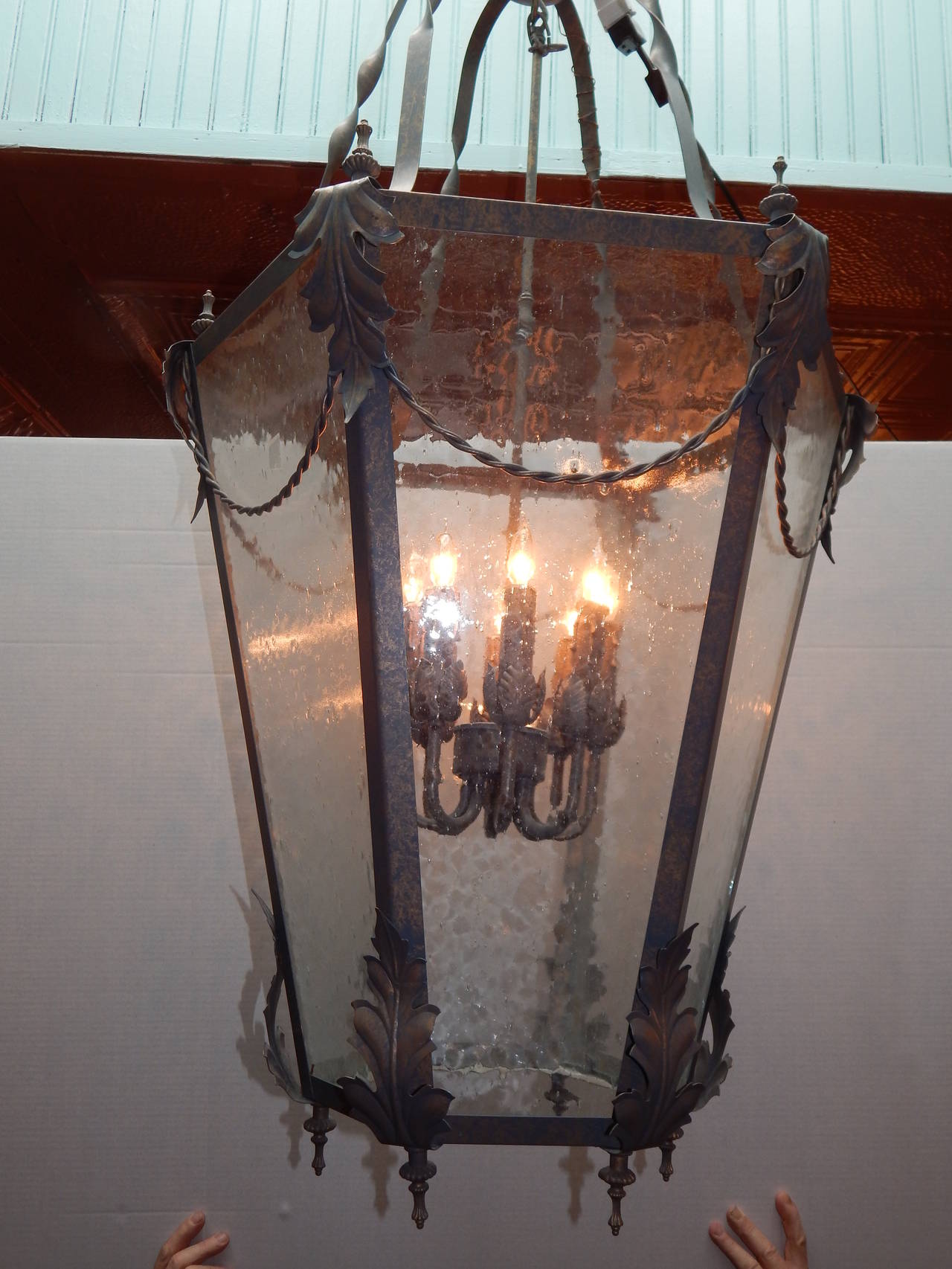 Large Verde Metal lantern, with glass panels made to look 18th century,
having eight interior lights.