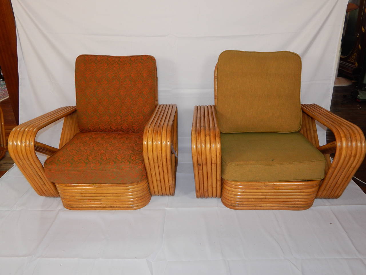 A three-piece rattan set, consisting of two large armchairs and a settee.
This style is referred to as the 