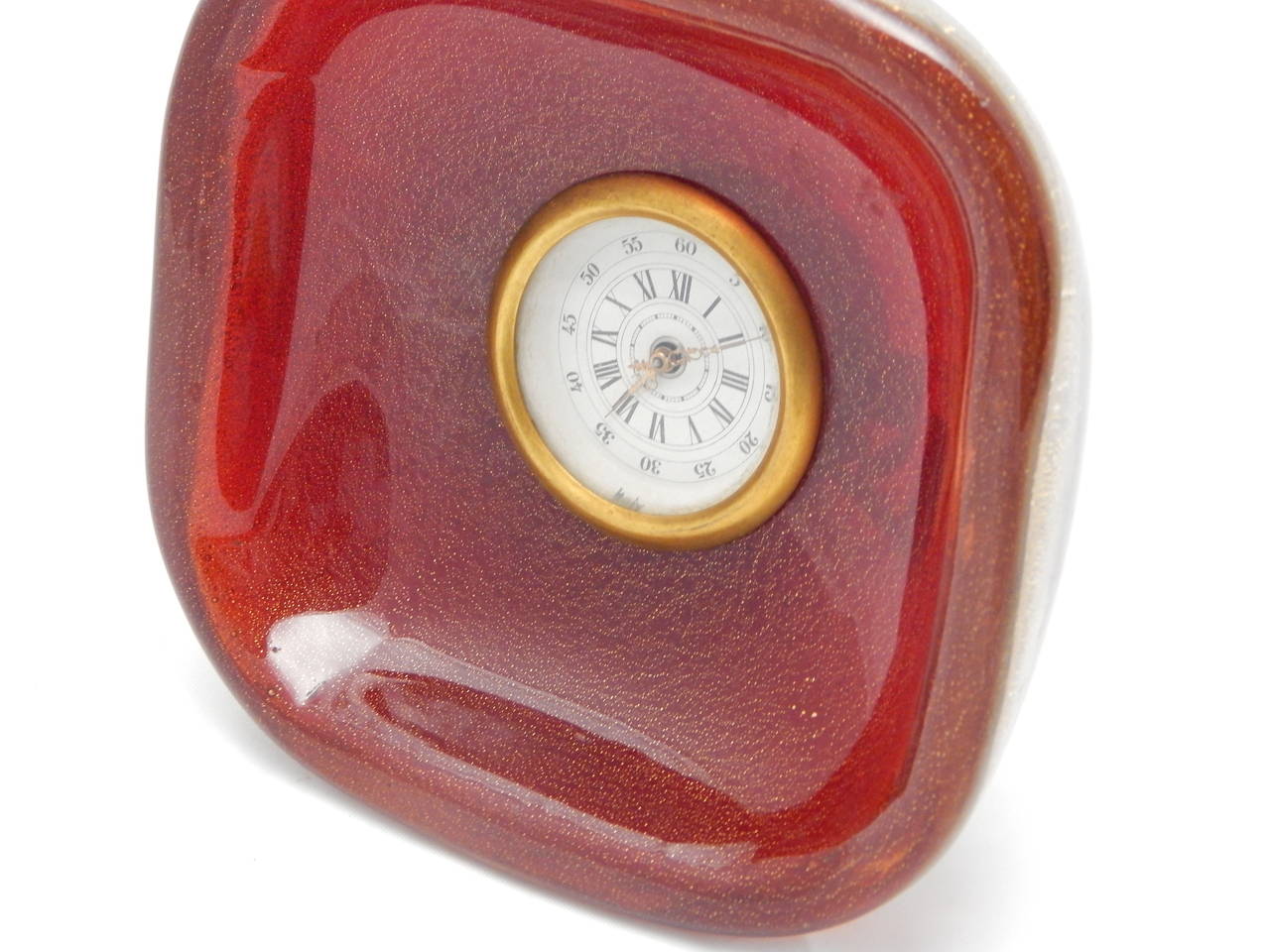 Ruby red Seguso Murano glass travel clock with original label.
Not running currently.