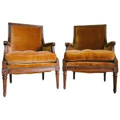 Pair of Louis XVI Style Walnut Bergere Chairs with Nail Head Trim, Circa 1940