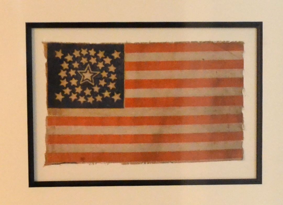 34 Star Civil War Flag with “Halo” Star Pattern, antique

Rare 34 Star Flag from the Civil War.
The flag is made of fine linen cloth. Printed by press stenciling. It was originally attached to a stick which was called a parade flag or a flag