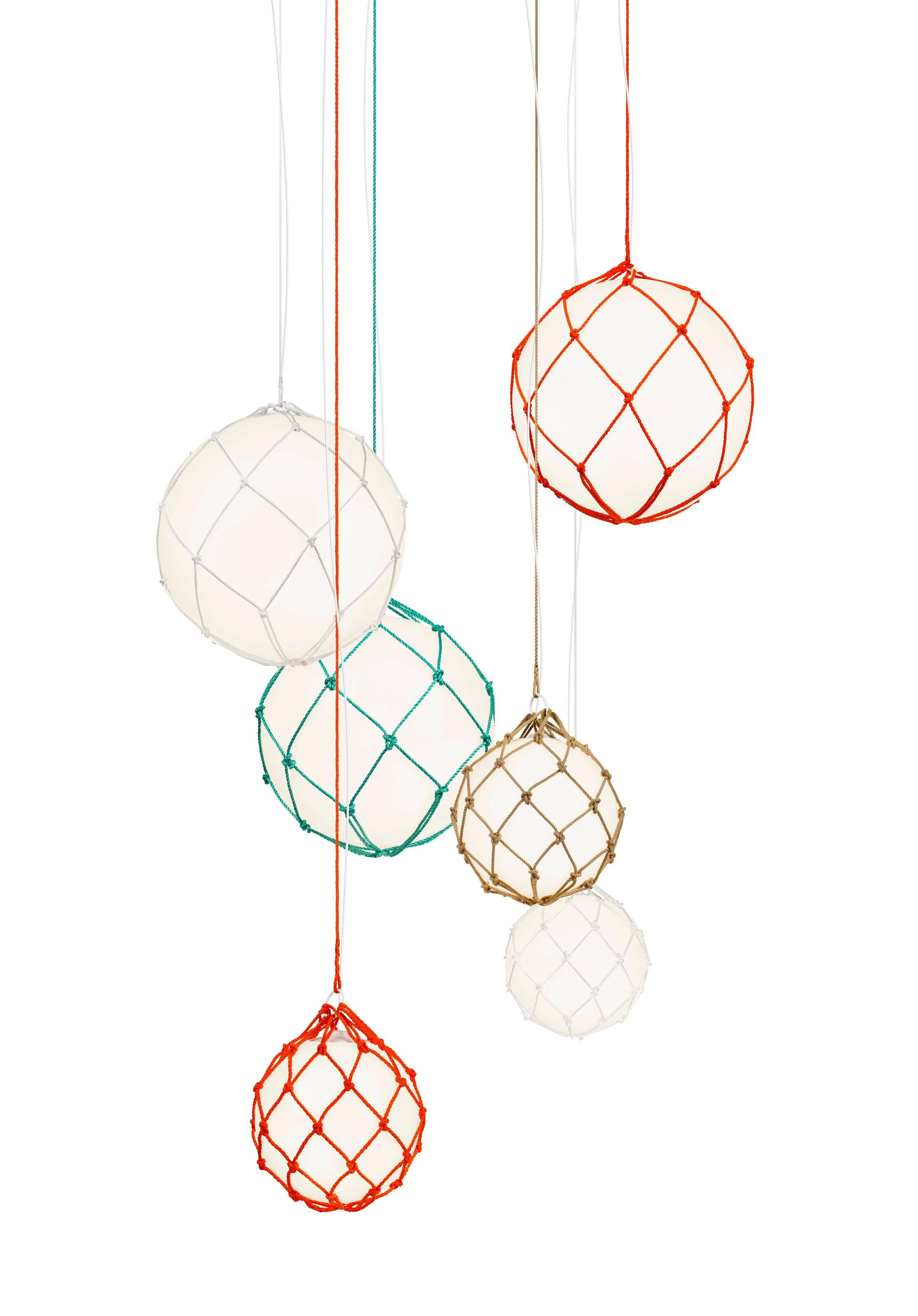 The handmade fisherman-cord nets that hold the round UV-stabile polythene globes bring with the Fisherman pendant, designed by Mattias Ståhlbom, the feel of beachside living. 

Environment: Indoor
Shade: Polythene
Cord: White
Cord length: 8