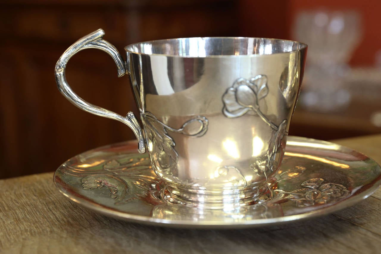 Unusual pair of cups and saucer of Art Nouveau period. Gallia metal which was bought out by Christofle.