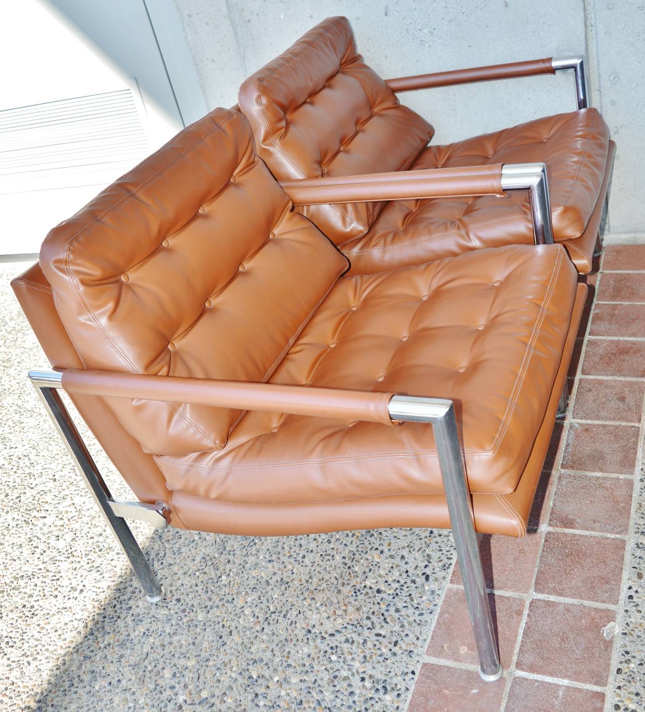 Polished Chrome and Button-Tufted Vinyl Lounge Chairs by Harvey Probber For Sale