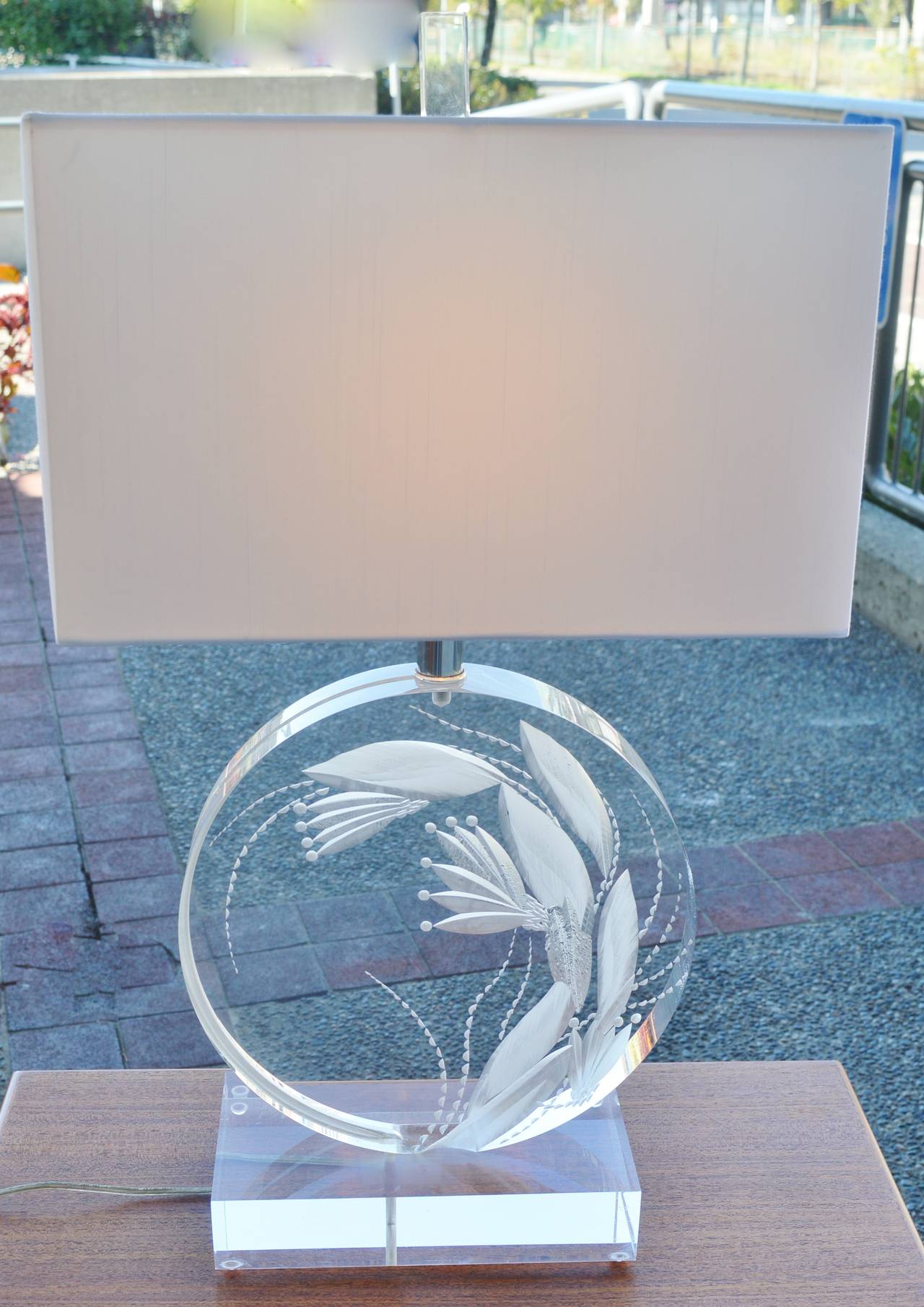 This amazing Lucite lamp is a signed original by Marlee and is far more intricate than any of her standard stacking Lucite lamps. This artfully crafted lamp has been beautifully etched with a stunning Art Nouveau styled floral design that cuts