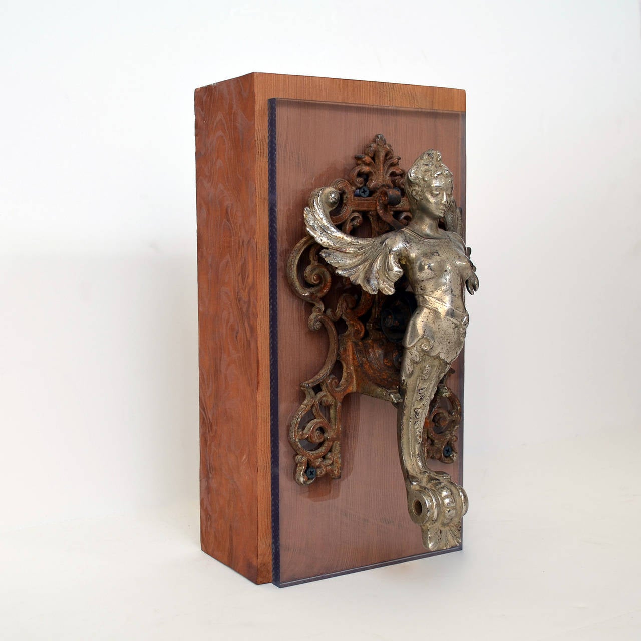 Unusual and rare door knocker, French Normandy 18th C.
Mounted on plexiglass and massif walnut wood bloc, unique must have.
dimension with bloc 15