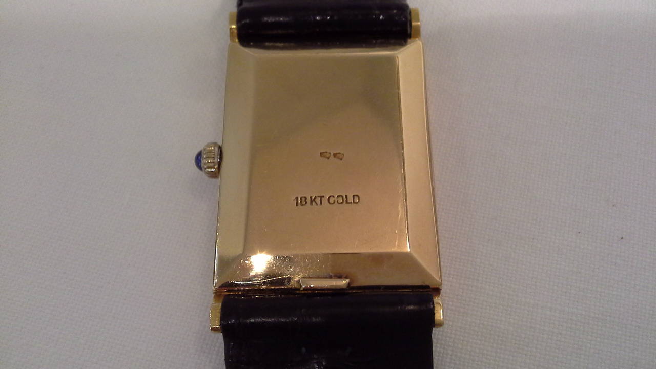 Art Deco Van Cleef & Arpels 18k Gold Wristwatch with a Cabochon Sapphire Crown