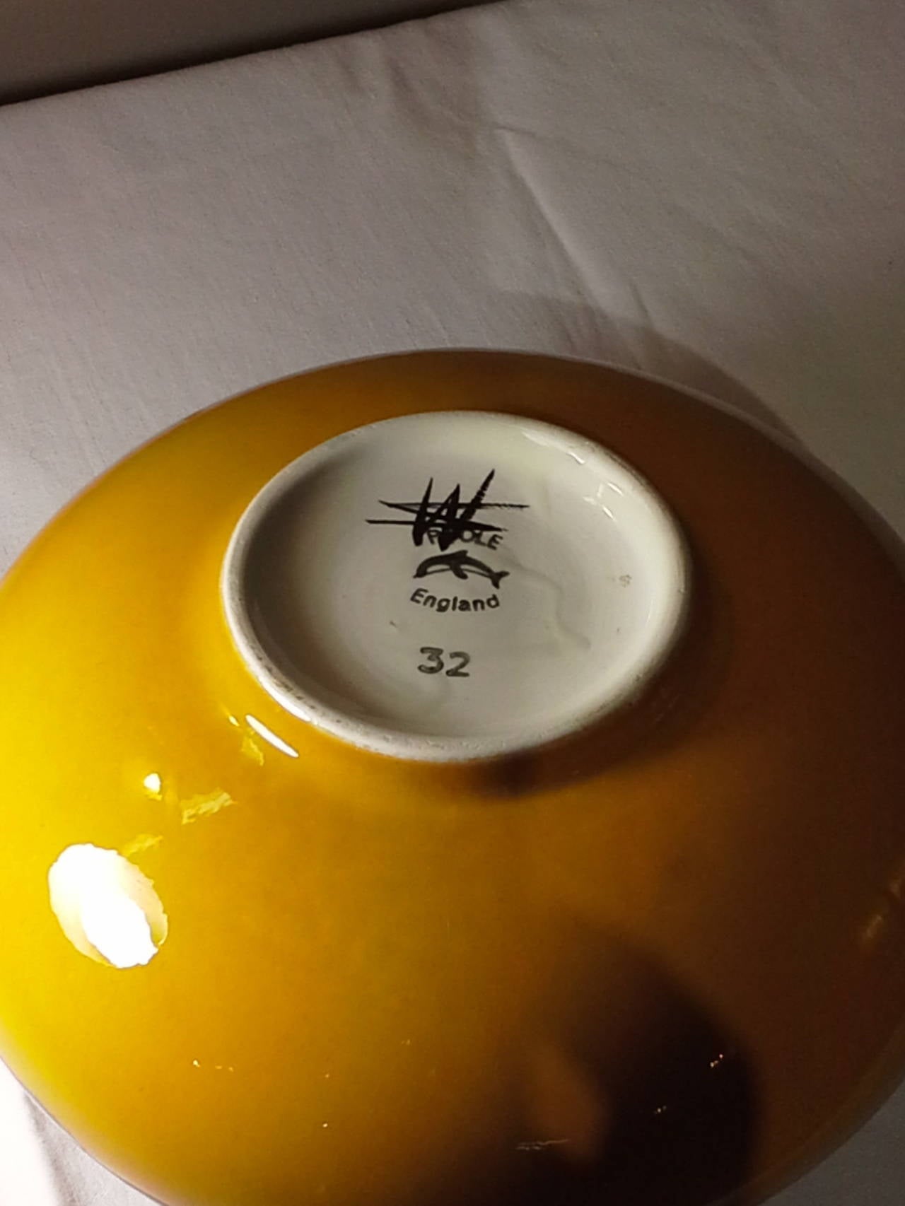 Poole Pottery Vase in a Geometric Pattern, Yellow mustard color and highlighted with orange,green and black. The bottom is stamped please see pics. The vase is 8