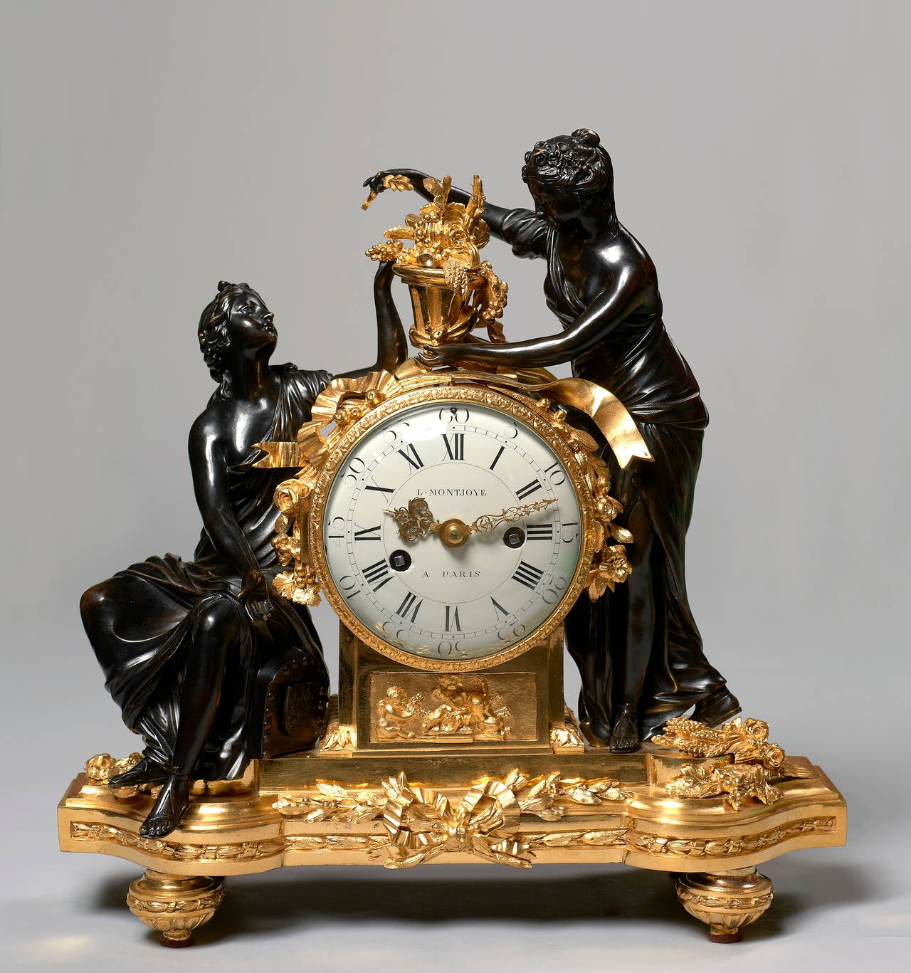 Louis Montjoye (1729 – circa 1815)
Maître horloger parisien le 21 août 1748

Rare Chased and Patinated Gilt Bronze Clock, Allegory of Abundance 

Paris, Louis XVI period, circa 1775-1780 
Height 38.5 cm; width 38 cm; depth 16.5 cm 

This