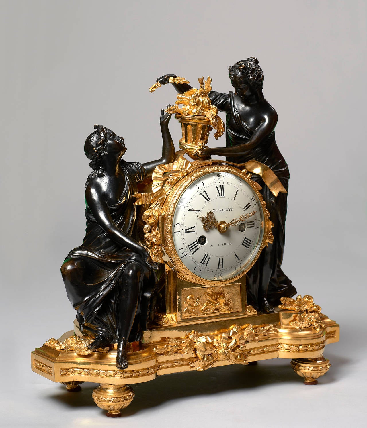 French Chased and Patinated Gilt Bronze Louis XVI Clock by Louis Montjoye