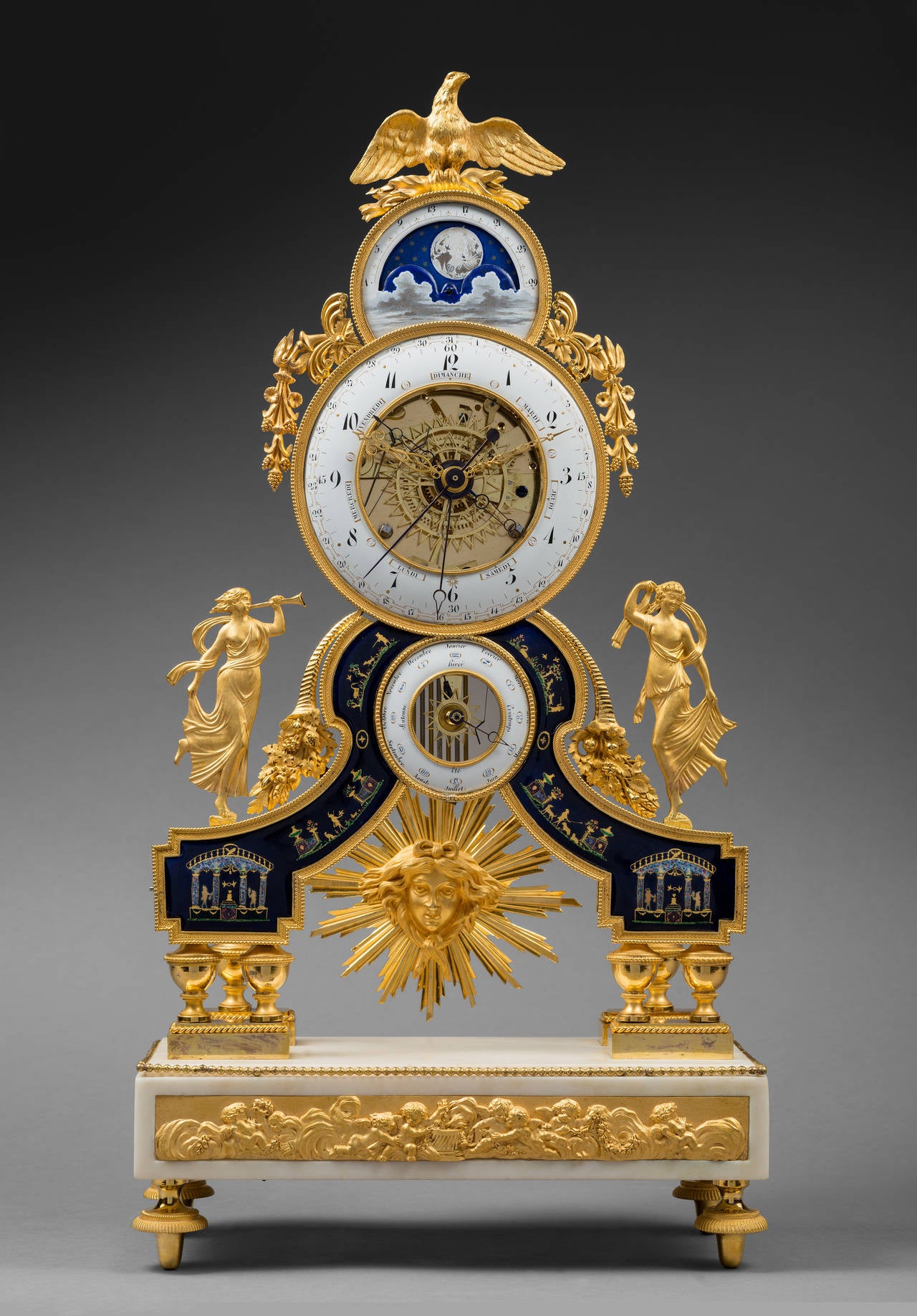 Enamels attributed to Joseph Coteau

Gilt Bronze, Enamel and Marble Skeleton Clock

Paris, Directoire period, circa 1795 
Height 53 cm, width 28 cm, depth 12 cm

An extremely beautiful Directoire gilt bronze, enamel and white marble skeleton